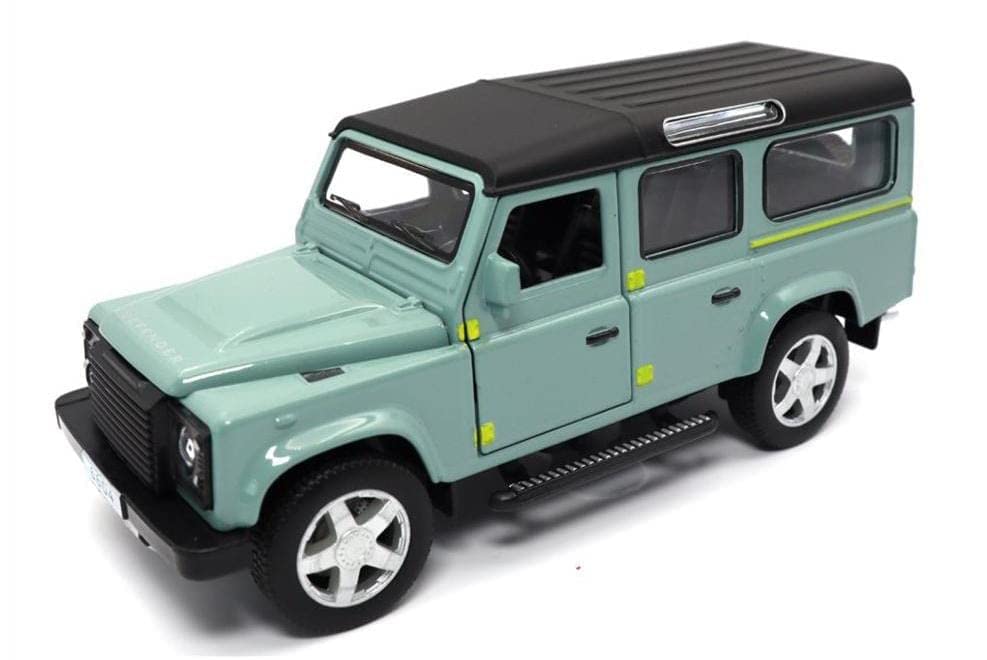 Model of a green Land Rover Defender on a white background