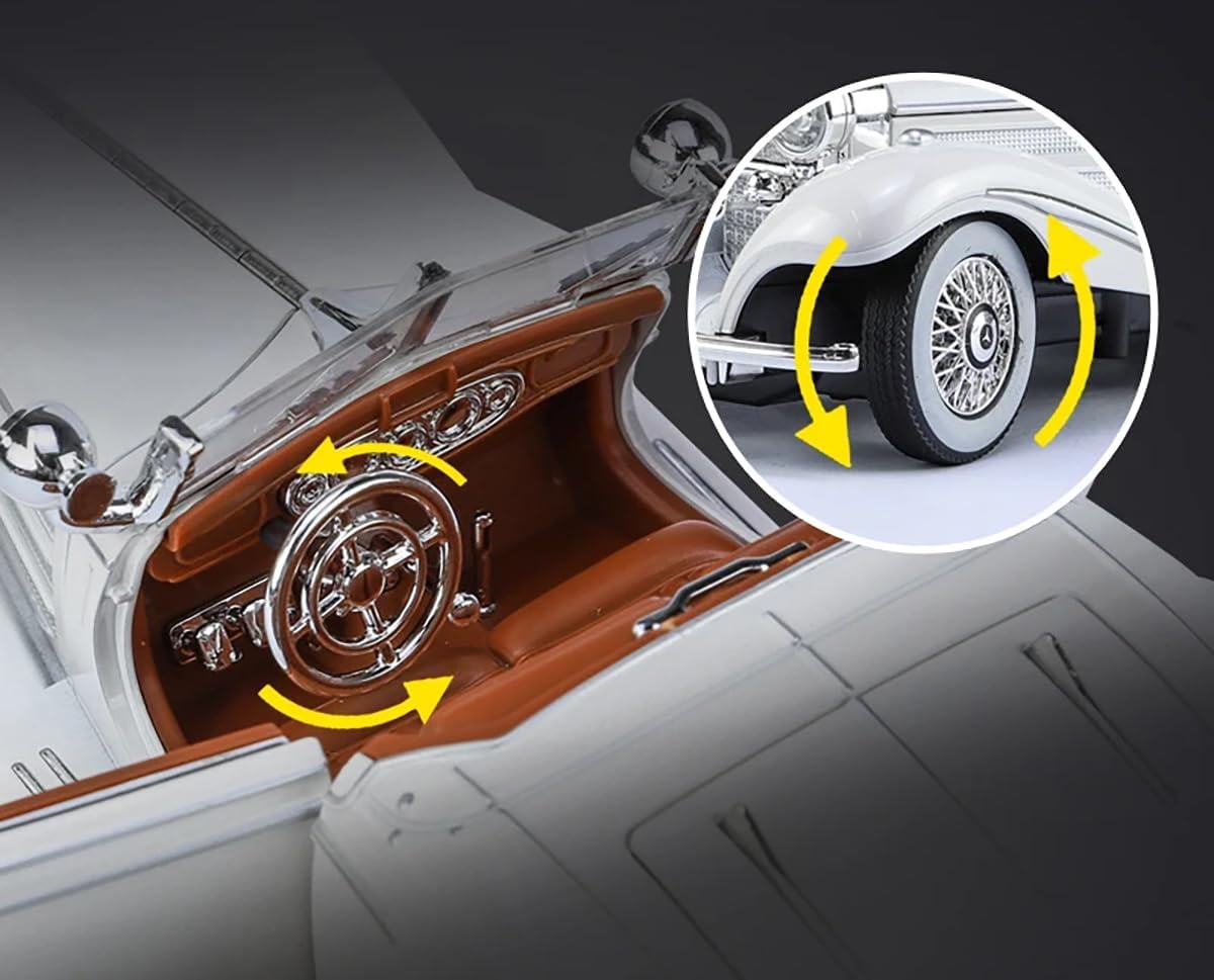 Close-up of a car's interior and wheel with detailed design elements.