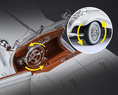 Close-up of a car's interior and wheel with detailed design elements.