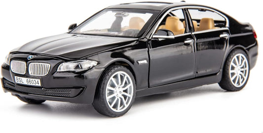 Black BMW model car on a white background