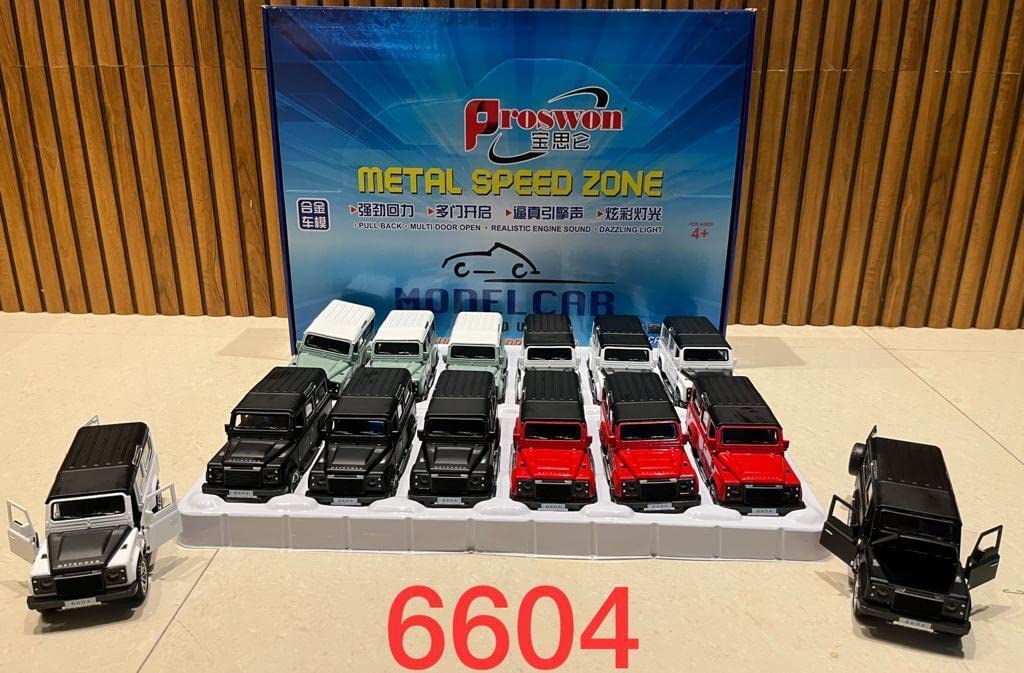 Collection of model cars displayed on a table with a promotional backdrop.