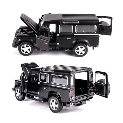 Black model SUV with open doors and hood on a white background