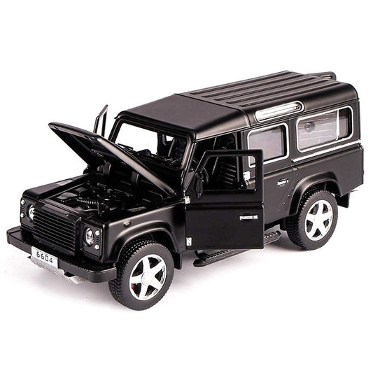 Black toy Land Rover Defender with open doors and hood on a white background