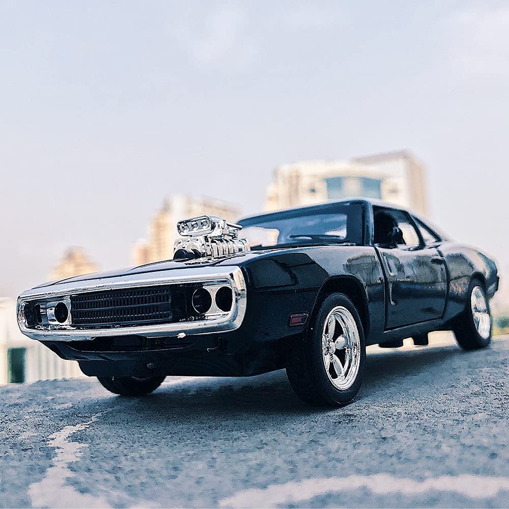 Vintage muscle car on a road with buildings in the background