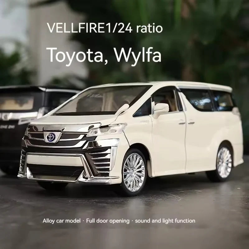Model toy car of a Toyota Vellfire with text indicating ratio and features.